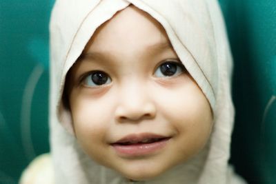 Close-up portrait of a smiling boy