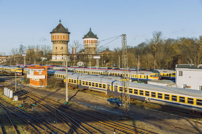 Train in city against sky