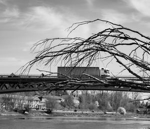 Bridge over river against sky