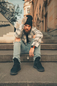 Man sitting on staircase