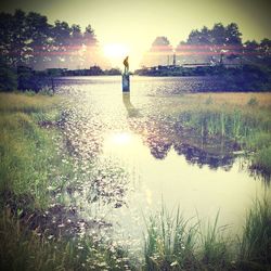 Scenic view of sunset over river
