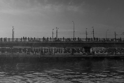 Bridge over river against sky