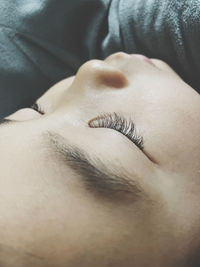 Close-up of woman lying down