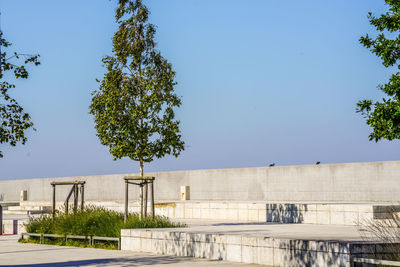 Low angle view of building against clear blue sky