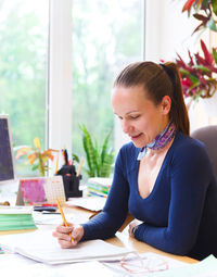 Woman working on table