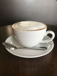 Close-up of coffee cup on table