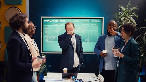 Business colleagues working in office