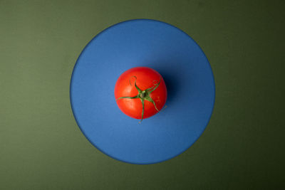 High angle view of red fruit in plate