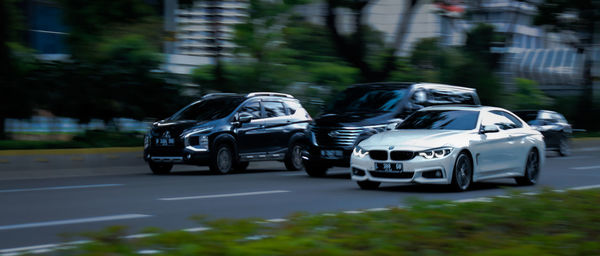 Cars on street in city