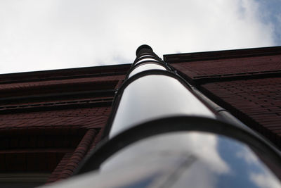 Low angle view of roof against sky