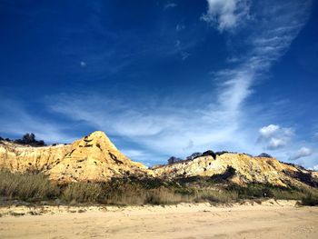 Scenic view of desert against sky