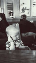 Boy sitting at home