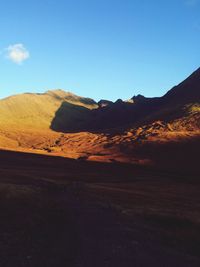 Scenic view of desert against sky