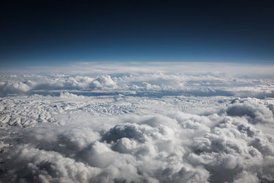 Aerial view of cloudscape against blue sky