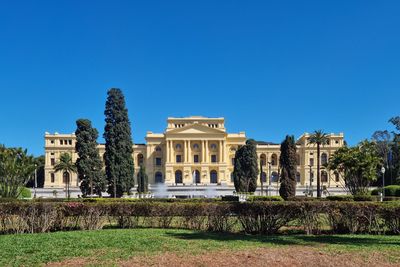 View of historical building against clear blue sky