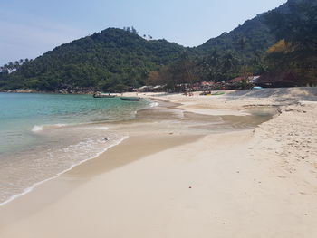 Scenic view of beach against sky