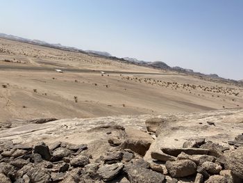 Scenic view of desert against clear sky