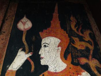 Close-up of painting on tree