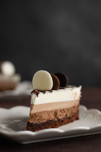 Close-up of cake slice in plate on table