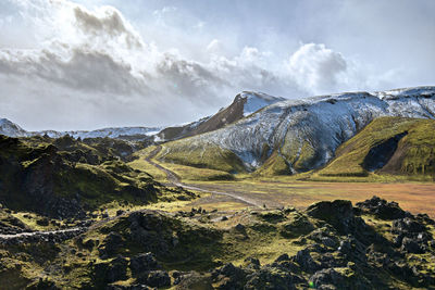 Scenic view of snowcapped mountains against sky