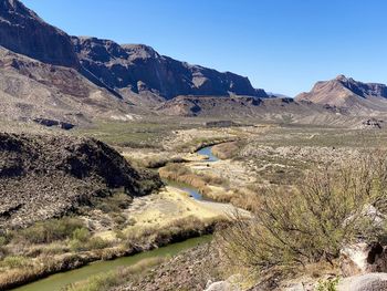 Scenic view of mountains against clear sky. rio grande river