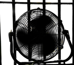 Low angle view of silhouette built structure against sky