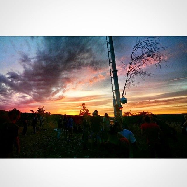 sunset, transfer print, sky, silhouette, auto post production filter, orange color, leisure activity, lifestyles, beauty in nature, scenics, cloud - sky, men, nature, person, large group of people, tranquil scene, cloud, tranquility, landscape