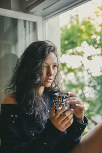 Portrait of a woman drinking glass