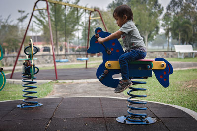 Boy playing at playground