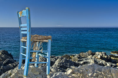 Scenic view of sea against clear blue sky