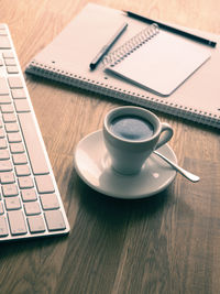 Close-up of coffee cup on table