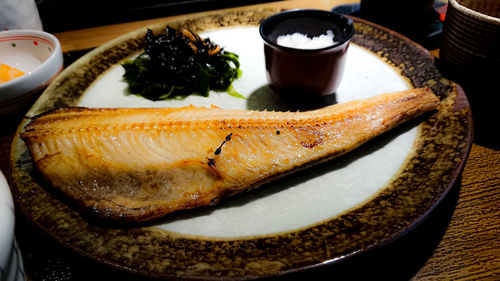 High angle view of fish served on table