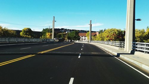 Road in city against sky