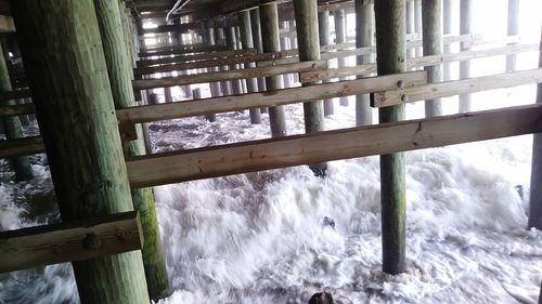Close-up of wood against sky