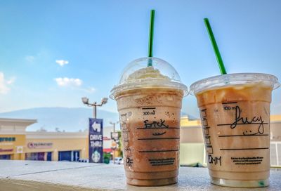 Close-up of drink against sky