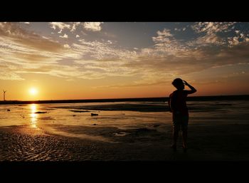 Scenic view of sea at sunset