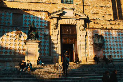 Group of people in front of building