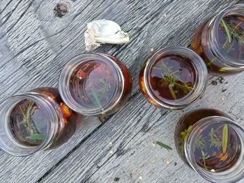High angle view of glass jar on table