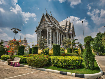 View of temple against building