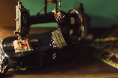 Close-up of padlocks hanging on metal
