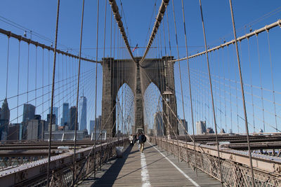 View of suspension bridge in city