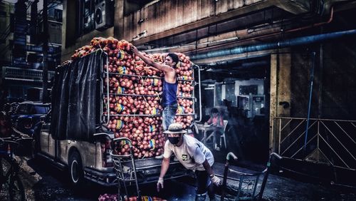 People at market stall