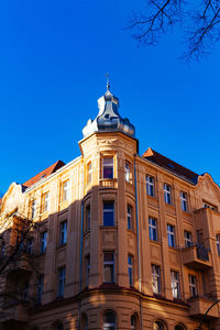 Facade of building against blue sky
