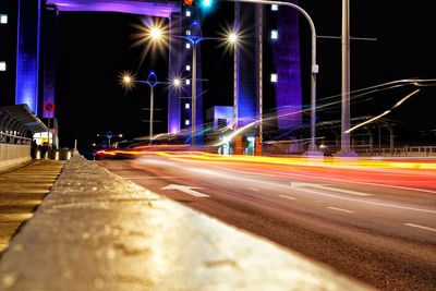 Light trails on city street at night