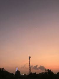 Silhouette tower against sky during sunset