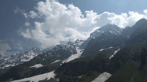 Scenic view of mountains against sky during winter