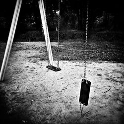 Swing hanging on sand