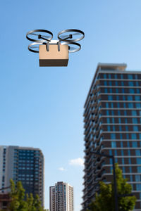 Low angle view of skyscrapers against clear sky