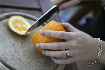 Close-up of hand holding ice cream