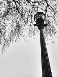 Low angle view of street light against sky